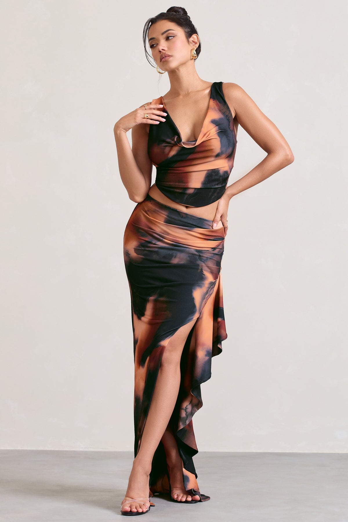 WB_CL128620158-FemmeClassiqueOrangeSmokePrintCowlCorsetCropTop_CL128621158-LaBelleOrangeSmokePrintRuffleMaxiSkirtWithThighSplit0