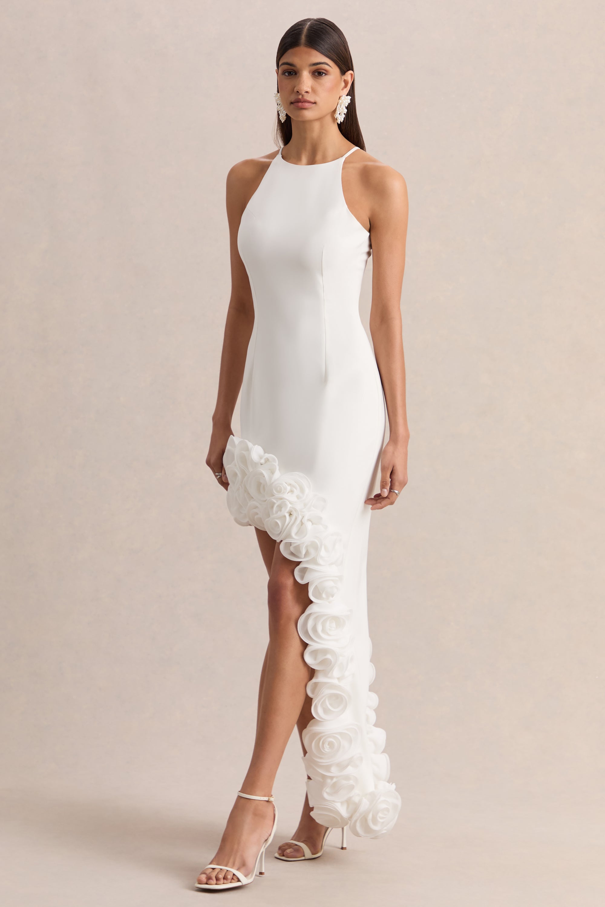 ECM_HR_CL137226110---Indira-_-White-Halter-Neck-Maxi-Dress-With-Asymmetric-Floral-Hem-01.jpg