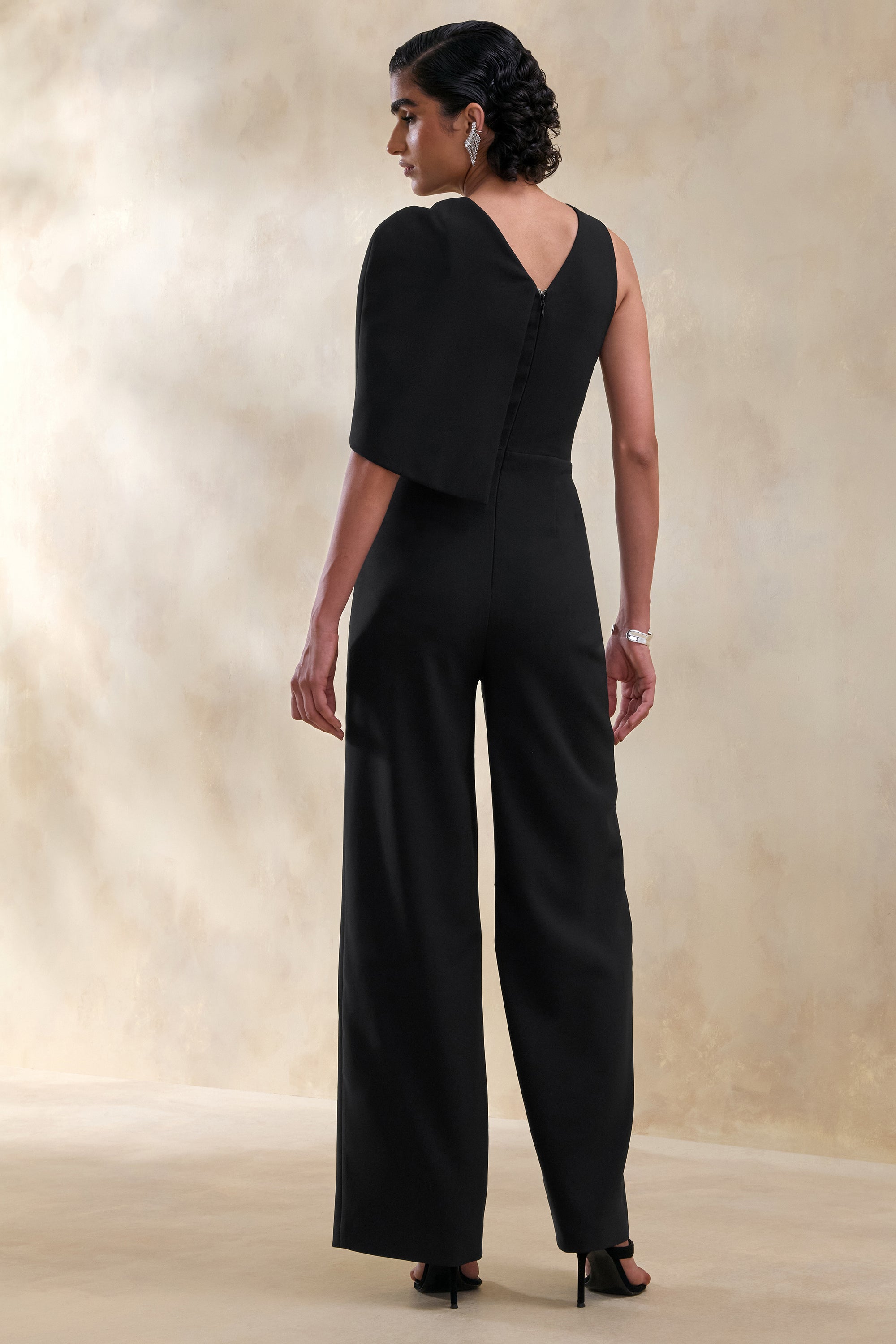 ECM_HR_CL137292001 - Quinley _ Black Asymmetric-Neck Jumpsuit With Cape-Sleeve 2.jpg