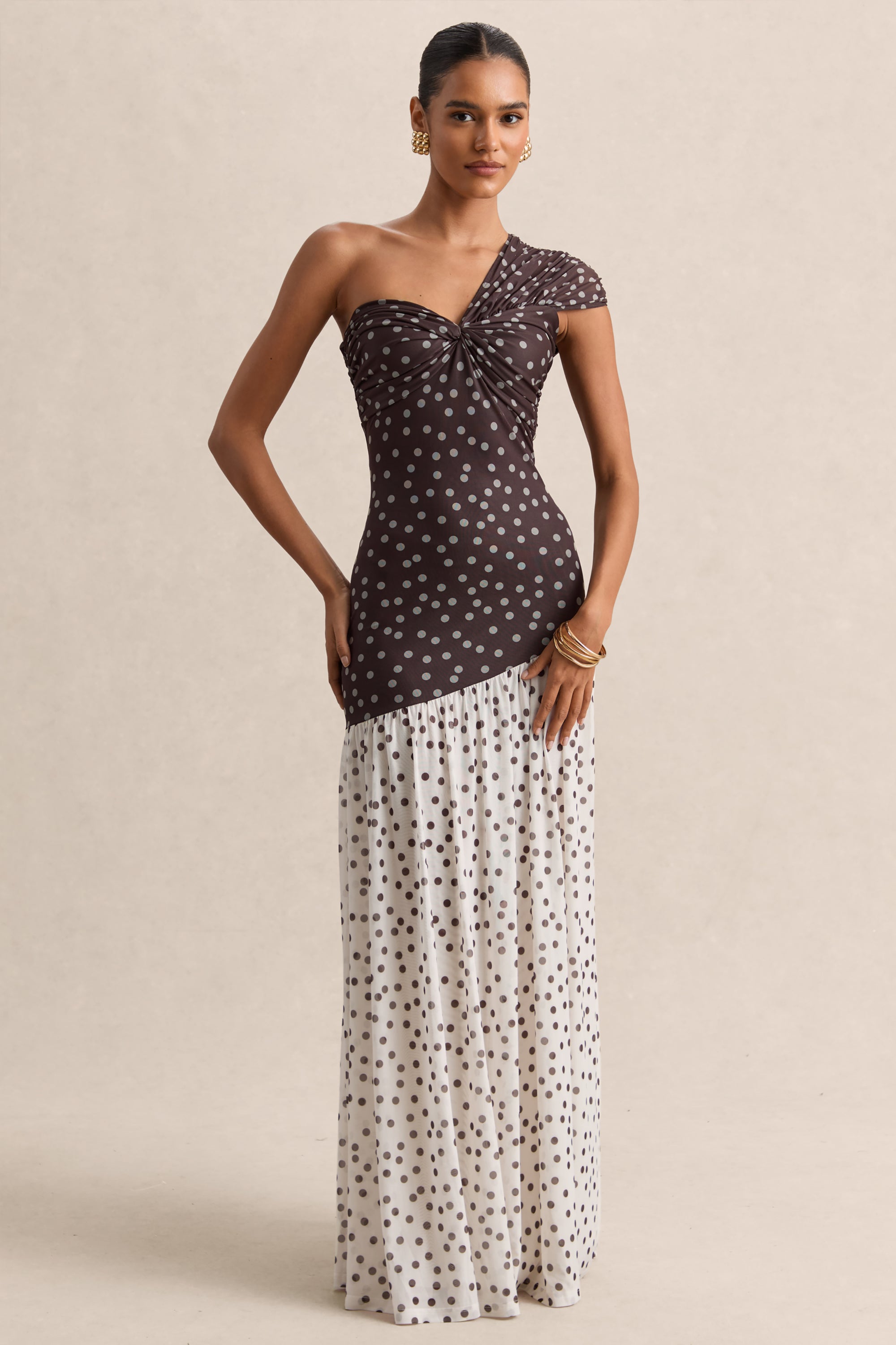 ECM_HR_CL137323021----Motira-_-Brown-Polka-Dot-Asymmetric-Neck-Maxi-Dress-With-Asymmetric-Drop-Waist-1_HERO_1.jpg