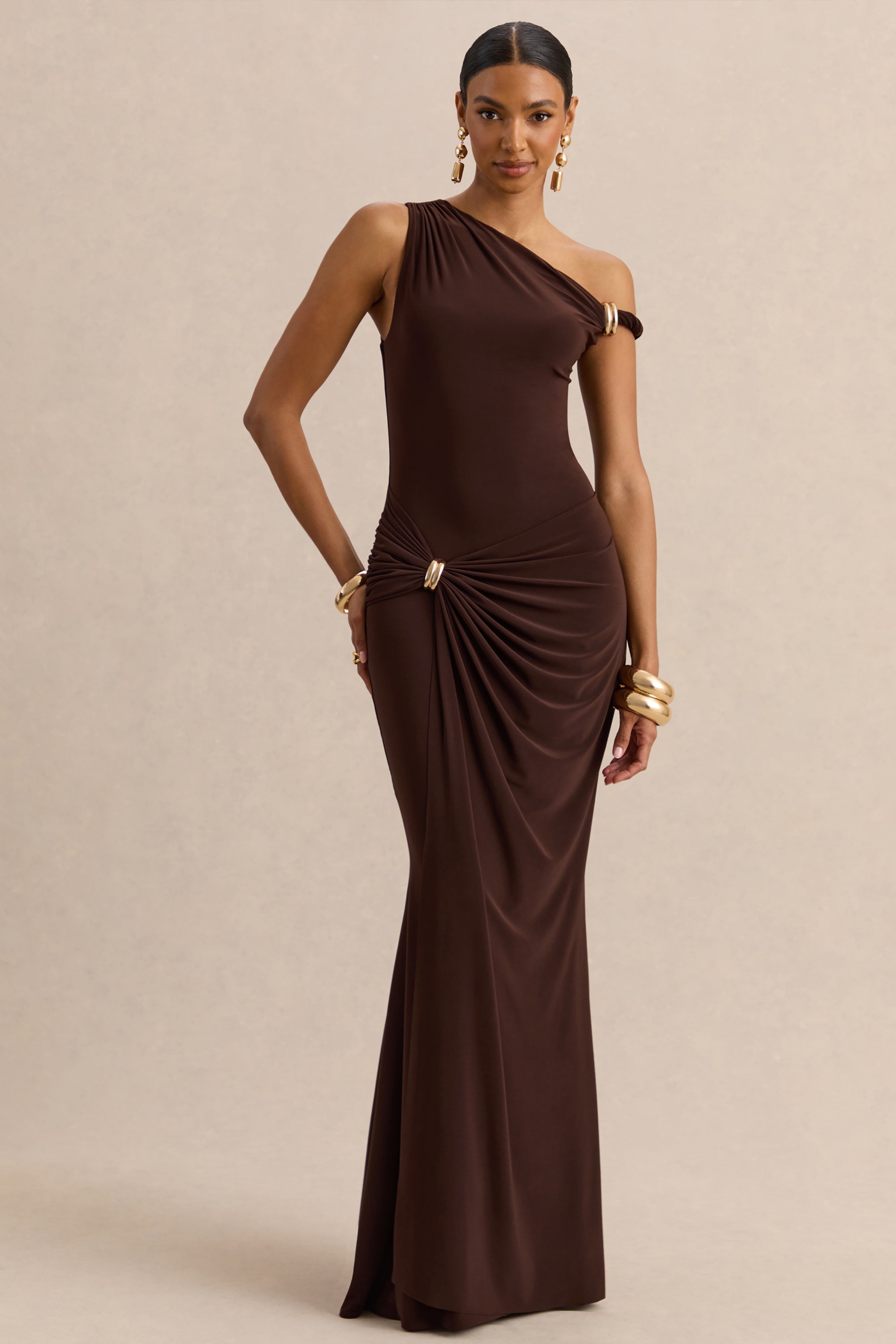 ECM_HR_CL137871021---Caelia---Brown-Asymmetric-Neck-Maxi-Dress-With-Gold-Detailing-And-Sash---08.jpg