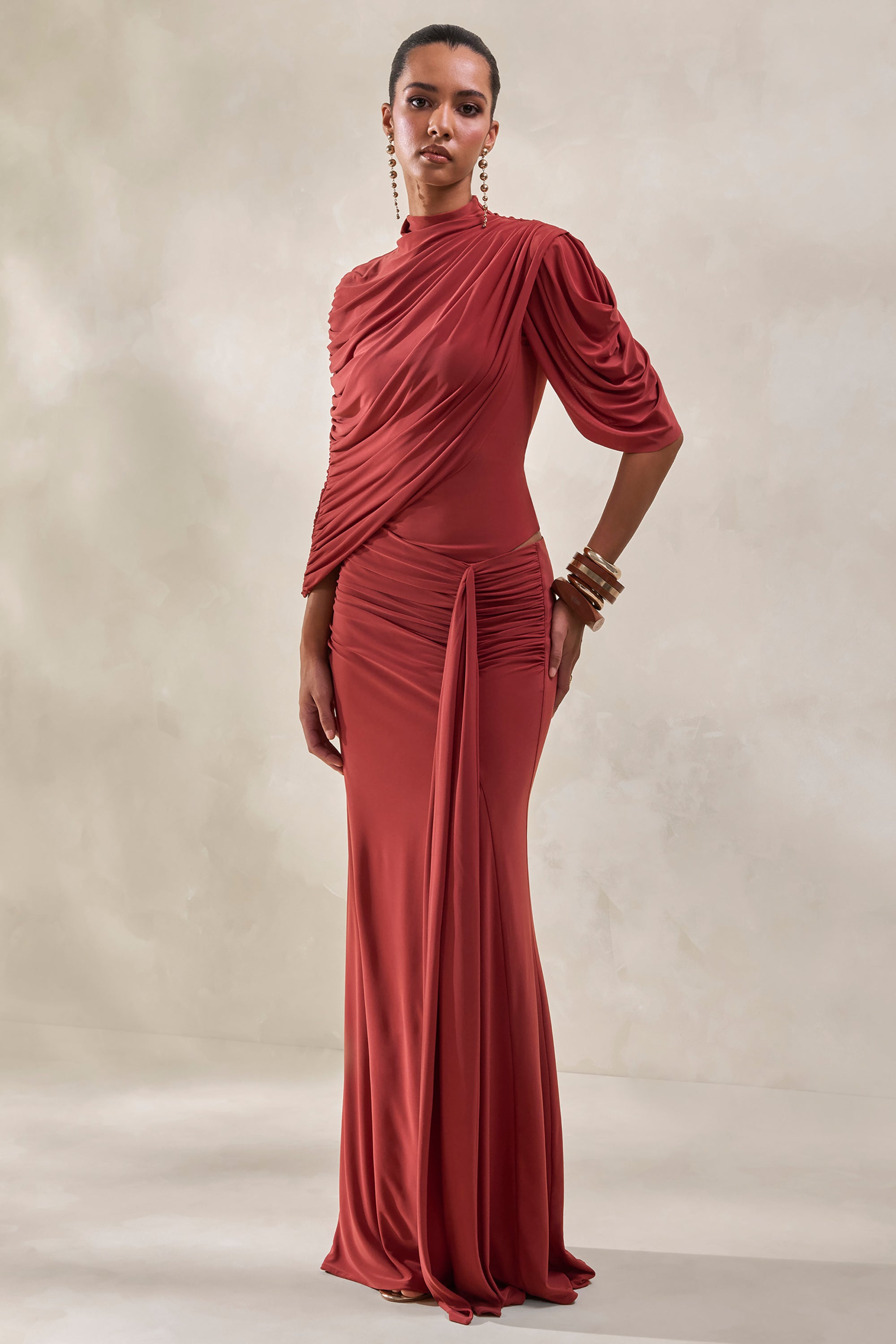 ECM_HR_CL137954071---Fenicia-_-Rust-High-Neck-Bodysuit-With-Cape-Detail-+-CL137956071---Mireya-_-Rust-Wrapped-Maxi-Skirt-With-Split0.jpg