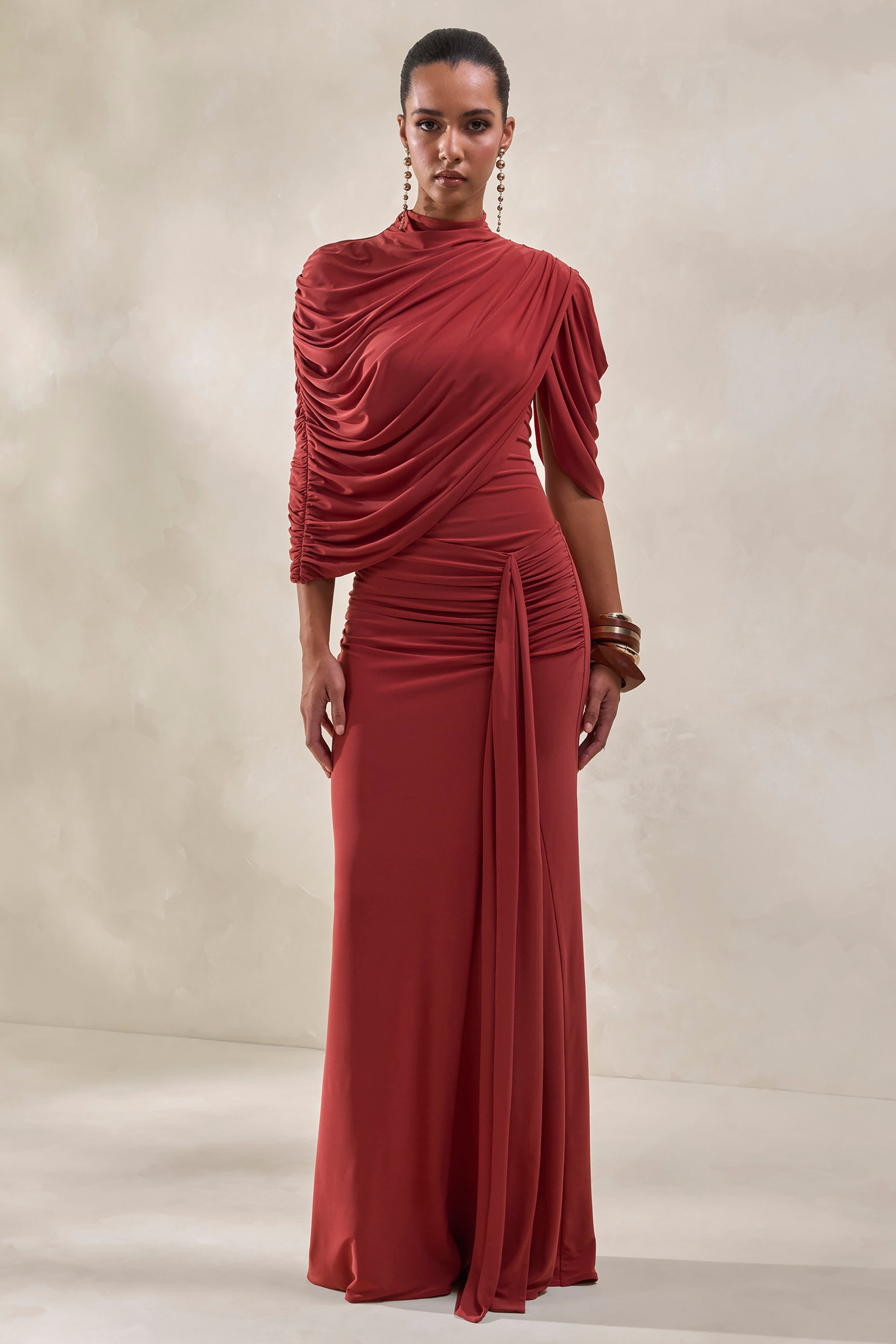 ECM_HR_CL137954071---Fenicia-_-Rust-High-Neck-Bodysuit-With-Cape-Detail-+-CL137956071---Mireya-_-Rust-Wrapped-Maxi-Skirt-With-Split1.jpg
