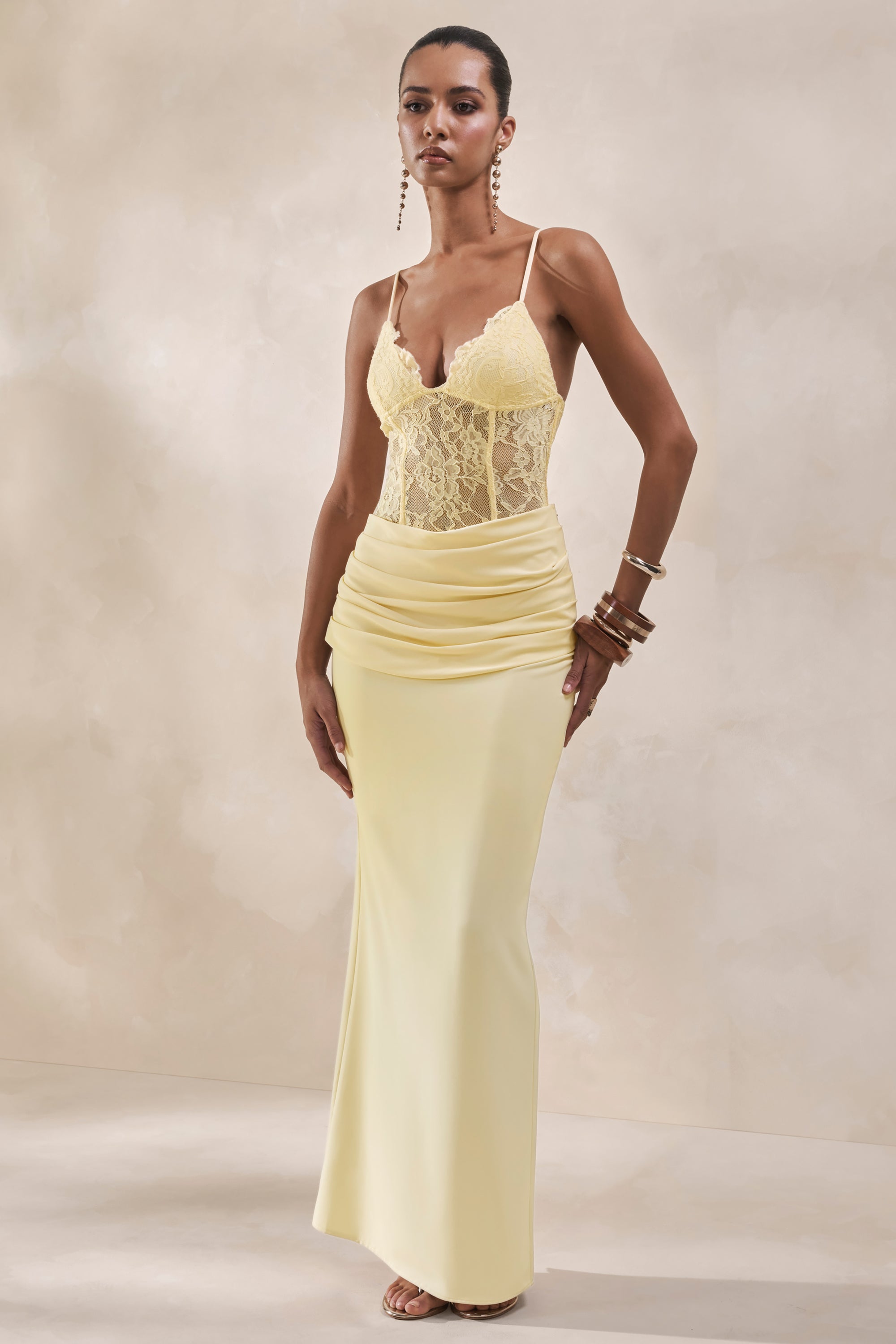 ECM_HR_CL137994121---Varela-_-Lemon-Lace-V-Neck-Bodysuit-+-CL137995121---Vionne-_-Lemon-Satin-Maxi-Skirt-With-Draped-Detailing1.jpg