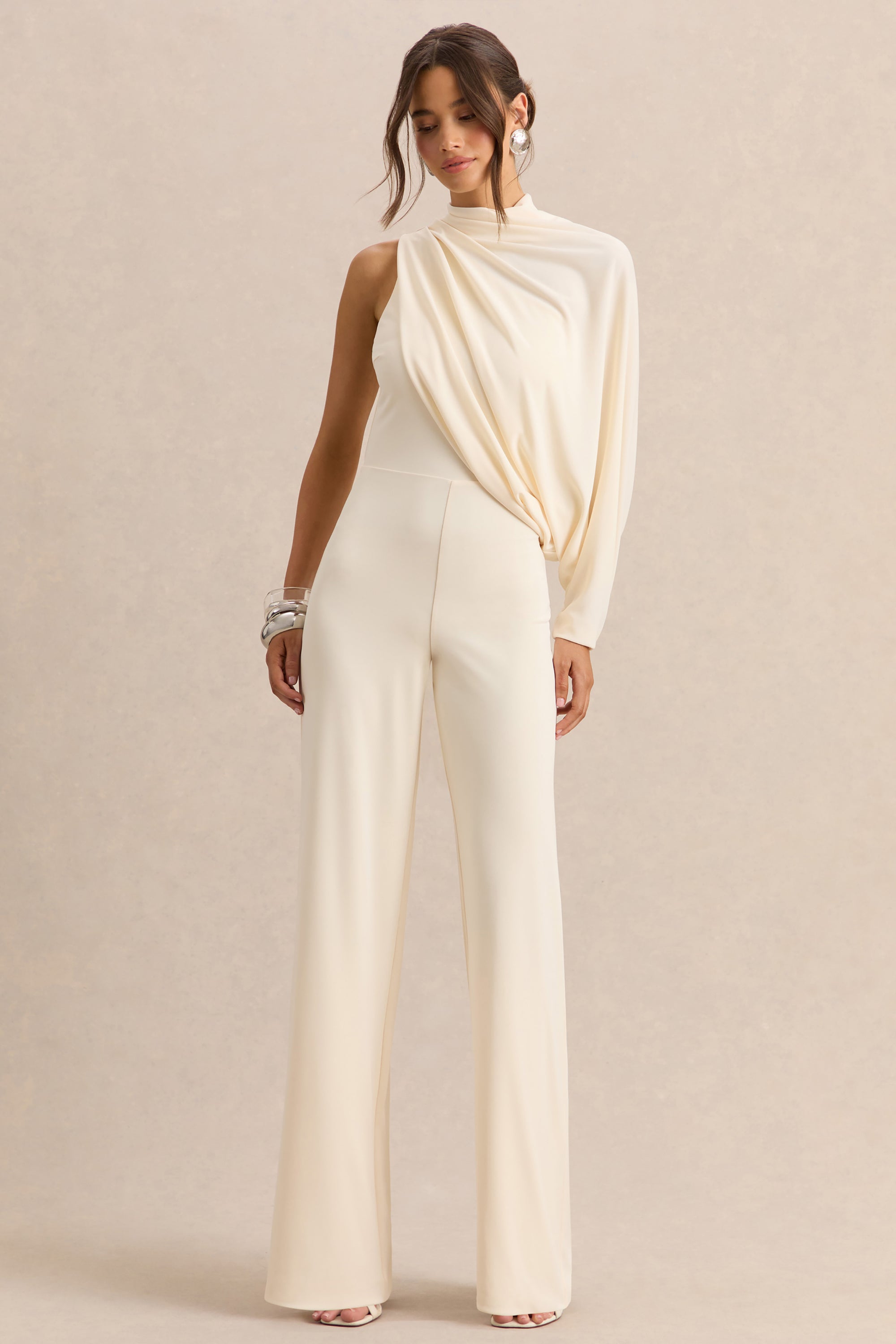 ECM_HR_CL138034111---Emoria-Cream-High-Neck-Jumpsuit-With-One-Long-Sleeve-1.jpg