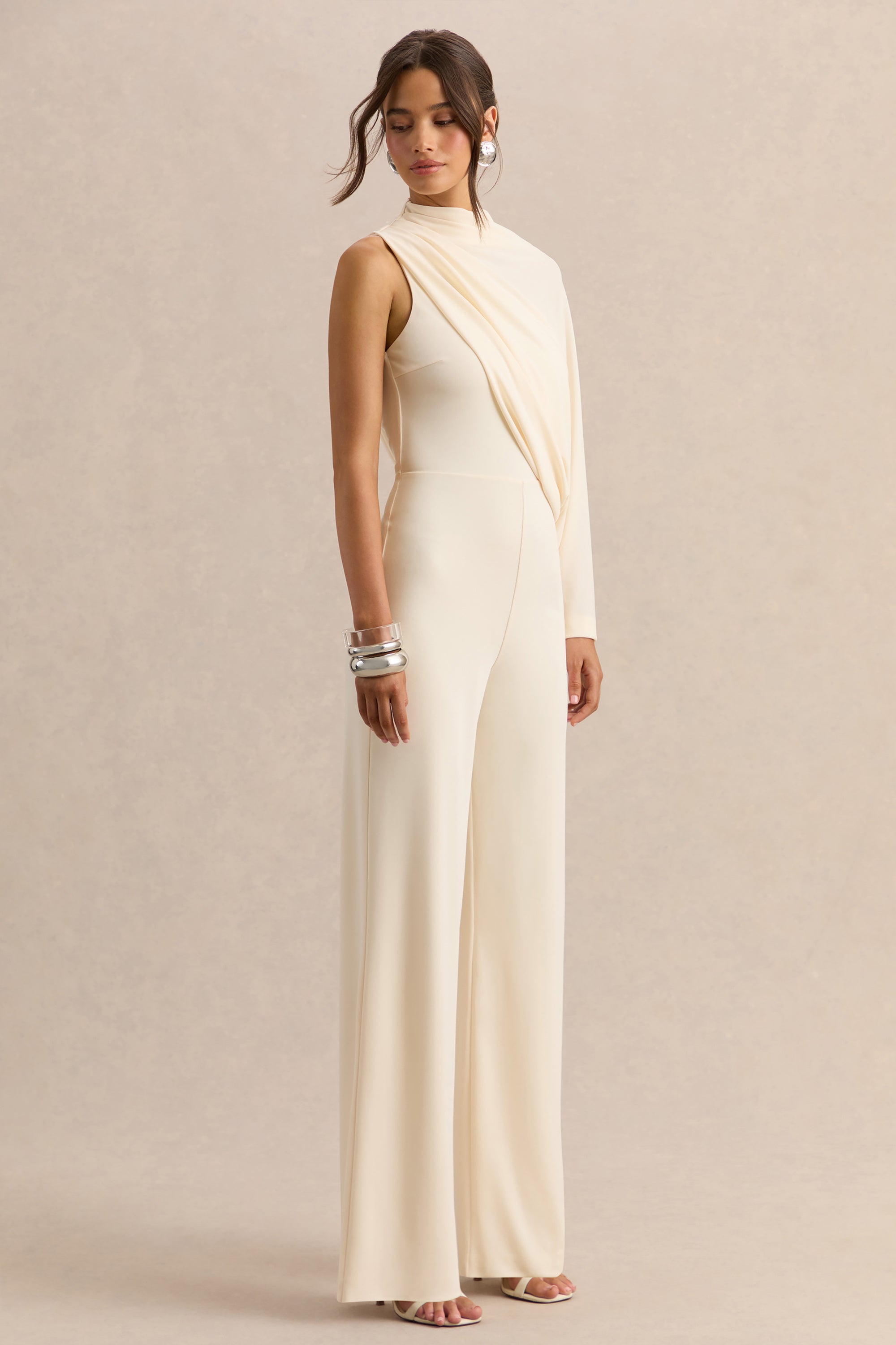 ECM_HR_CL138034111---Emoria-Cream-High-Neck-Jumpsuit-With-One-Long-Sleeve-2.jpg