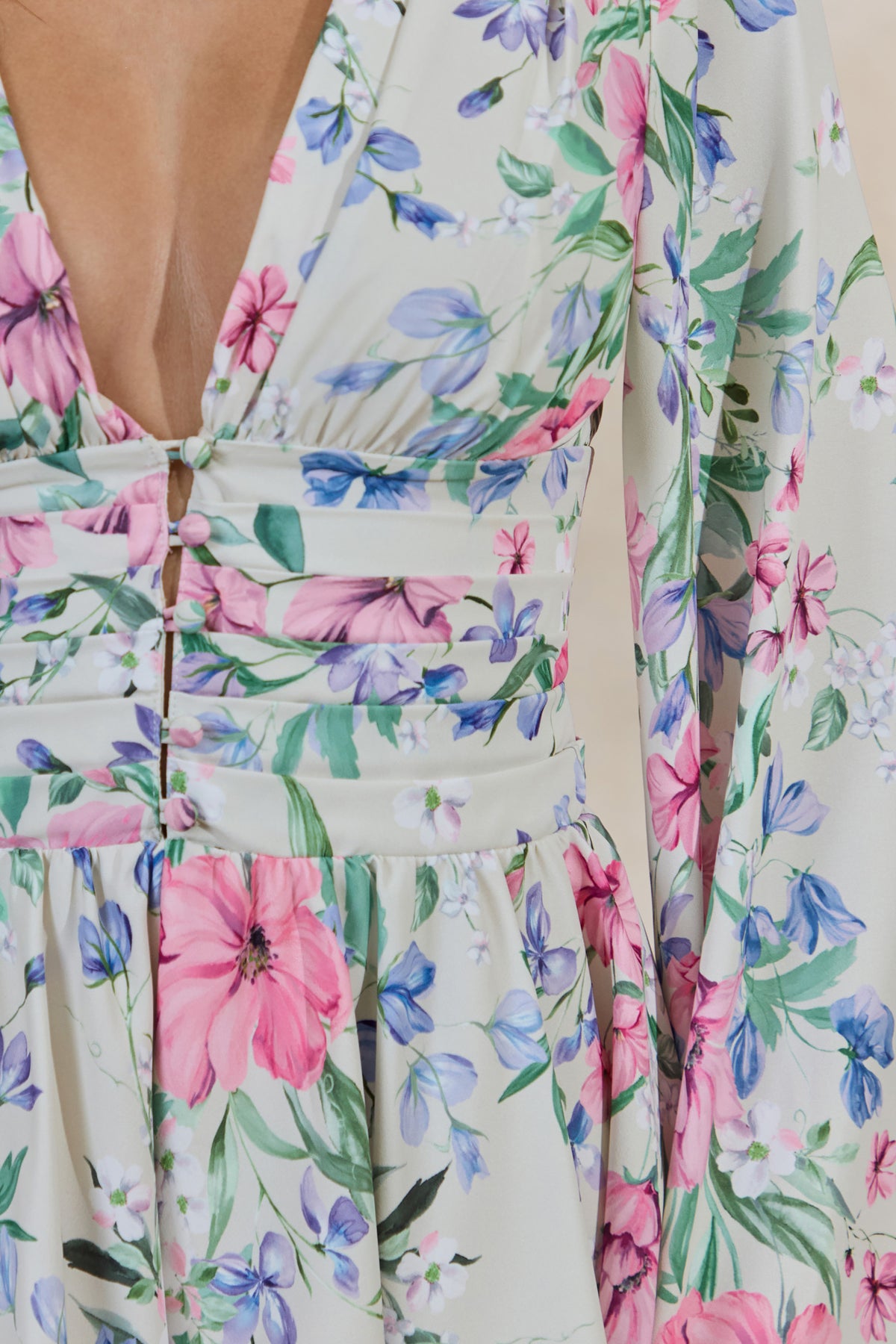 ECM_HR_CL138202111---Kismet-_-Cream-Floral-Print-Plunge-Neck-Playsuit-With-Bell-Sleeves2.jpg