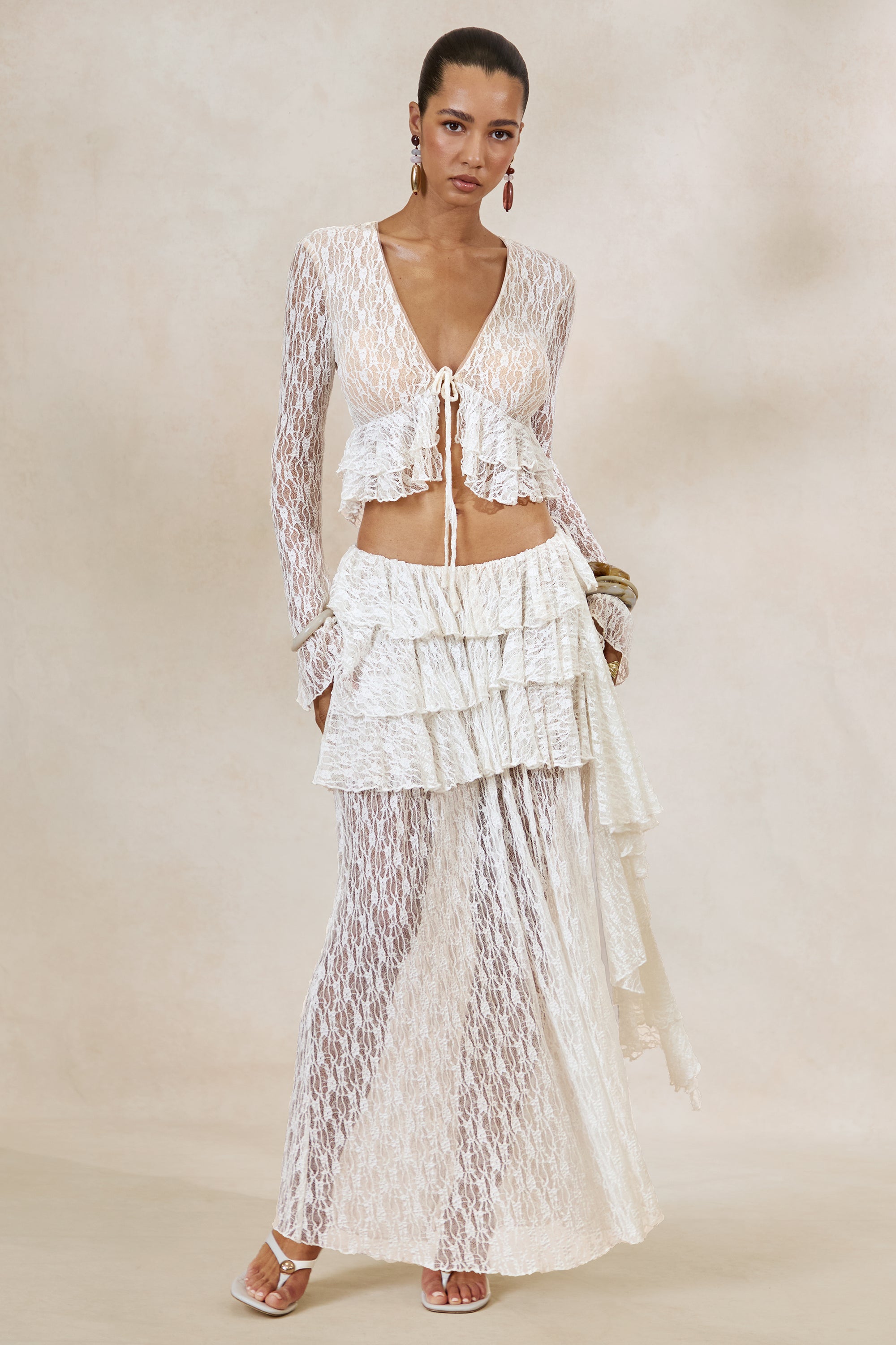 ECM_HR_CL138498110 - Astella | White Lace Plunge-Neck Maternity Top With Ruffled Trim + CL138499110 - Astella | White Lace Asymmetric-Waist Maternity Maxi Skirt With Ruffled Detailing0.jpg