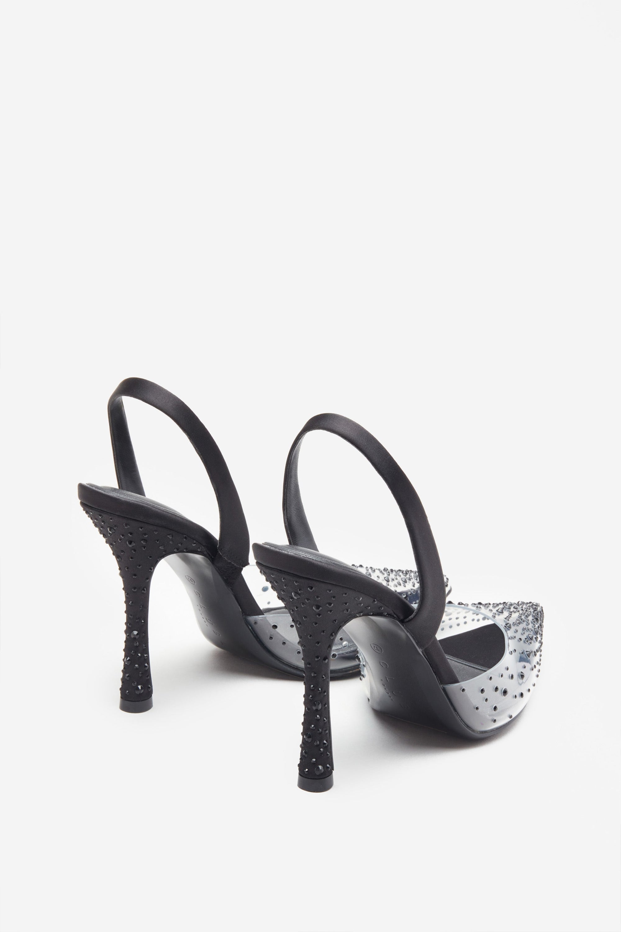 Covergirl | Tacones negros y transparentes con brillantes
