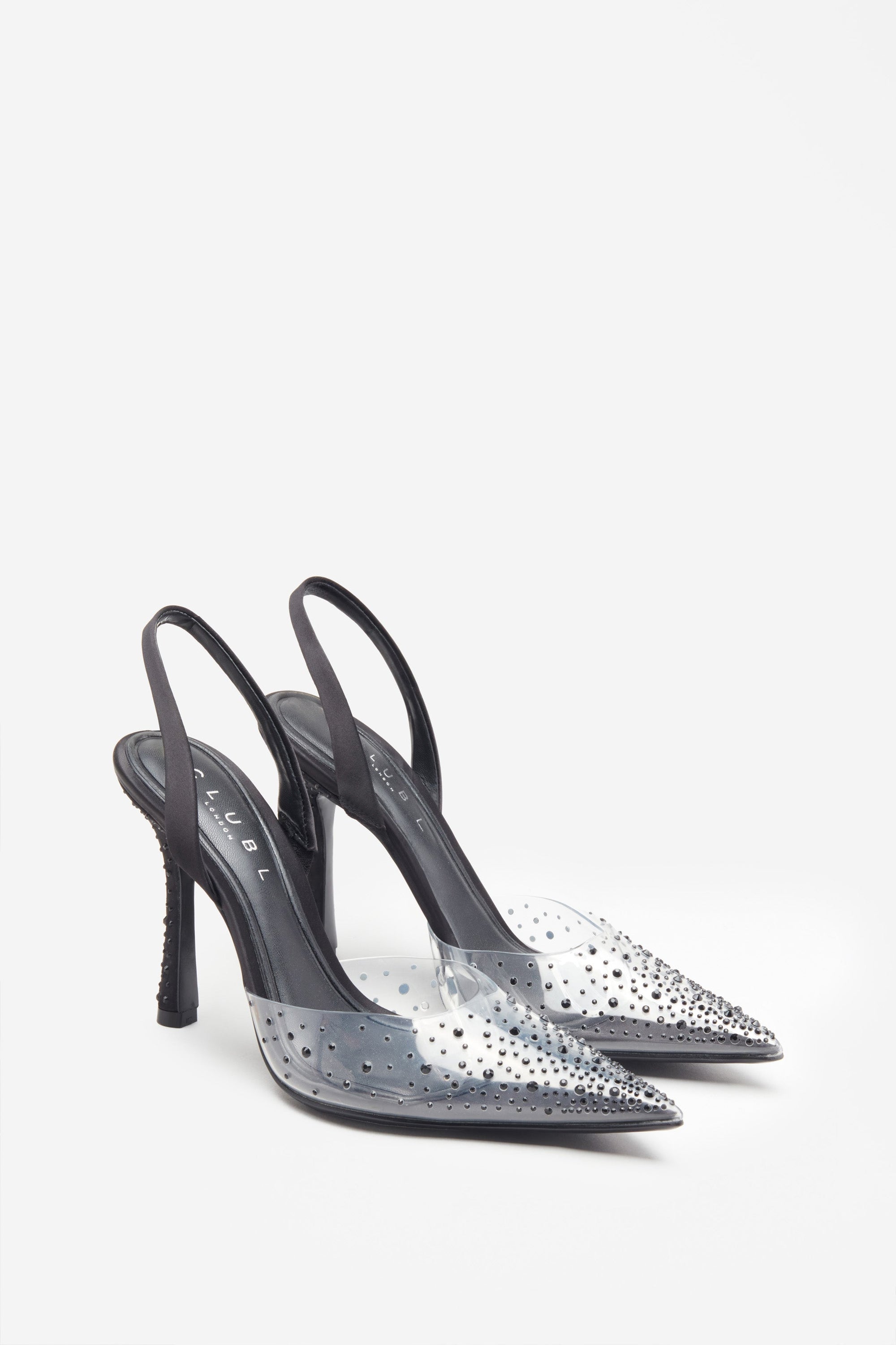 Covergirl | Tacones negros y transparentes con brillantes