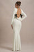 Rosalee | Vestido largo color crema de manga larga con espalda descubiertacon adornado con lazos